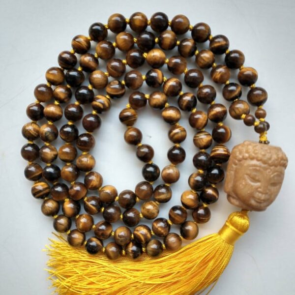 pruunid ja kollased kristalli pärlid buddha heledal taustal kollane tutt Mandala ILU väeehted / Tiigrisilma kaitse Mala-palvehelmed